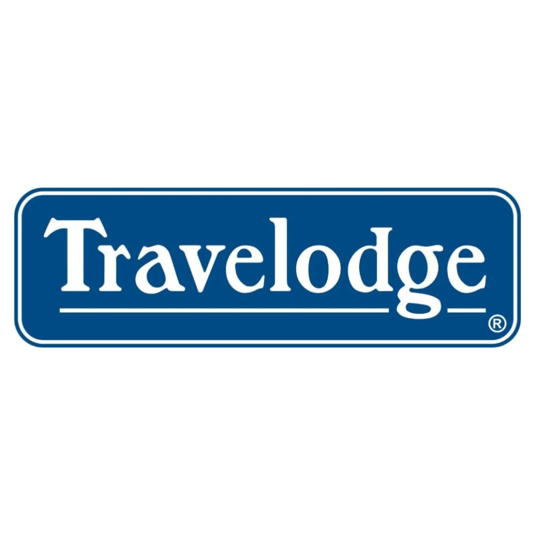 โลโก้ Travelodge newstep work and travel Rapid City, SD